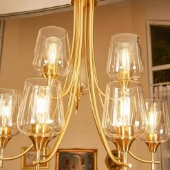 9-Light Shaded Tiered Aged Brass Chandelier with Clear Glass Shade by Pia Ricco -KINWELL shop aged brass pia ricco chandeliers 1jay 51949bb 1f 1000