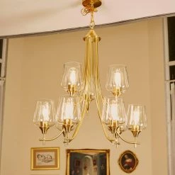 9-Light Shaded Tiered Aged Brass Chandelier with Clear Glass Shade by Pia Ricco -KINWELL shop aged brass pia ricco chandeliers 1jay 51949bb 31 1000