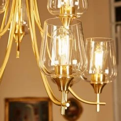 9-Light Shaded Tiered Aged Brass Chandelier with Clear Glass Shade by Pia Ricco -KINWELL shop aged brass pia ricco chandeliers 1jay 51949bb 4f 1000
