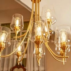 9-Light Shaded Tiered Aged Brass Chandelier with Clear Glass Shade by Pia Ricco -KINWELL shop aged brass pia ricco chandeliers 1jay 51949bb c3 1000